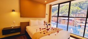 Letto o letti in una camera di Hotel Raices Machupicchu
