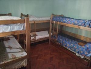 Una cama o camas cuchetas en una habitación  de HOSTEL ATG
