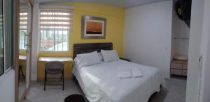 Кровать или кровати в номере Casa Jac