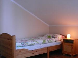 Giường trong phòng chung tại Domek Kozacki
