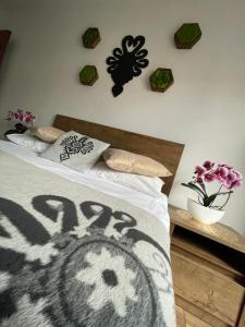 Łóżko lub łóżka w pokoju w obiekcie Apartament Krupówki Centrum
