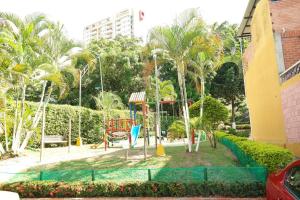 a playground in a park with a playground at Casa Anillo vía, cerca a CC Cañaveral y Clínica in Floridablanca