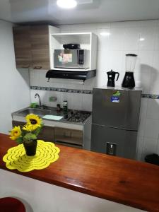 Η κουζίνα ή μικρή κουζίνα στο Acogedor apartamento en Cartagena +7 φωτογραφίες