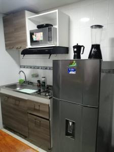 Η κουζίνα ή μικρή κουζίνα στο Acogedor apartamento en Cartagena