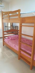 Postel nebo postele na pokoji v ubytování Pakin house