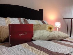 Katil atau katil-katil dalam bilik di Monteluce Condominium Apartment +22 gambar