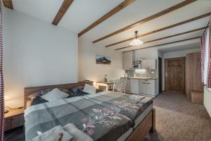 Ein Bett oder Betten in einem Zimmer der Unterkunft Privat LeNa