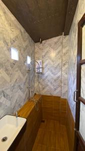 Ванна кімната в ภูคำฮ้อมคลิฟฟ์ลอดจ์ แอนด์ โฮมสเตย์ Phu come home cliff Lodge & Homestay