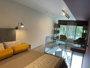 Posteľ alebo postele v izbe v ubytovaní SeaSide Loft Kavala