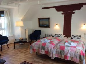 Postel nebo postele na pokoji v ubytování Guldbjerghus apartment