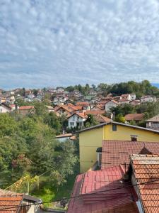 a view of a city with houses and roofs at Apartman Maki in Sarajevo