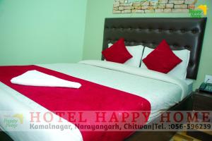 Hotel Happy Home客房内的一张或多张床位
