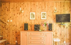Televízia a/alebo spoločenská miestnosť v ubytovaní Holiday Home Sobòtka Pod Debami + 7 fotografií