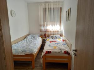 Postel nebo postele na pokoji v ubytování Savić Tara