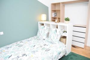 Postel nebo postele na pokoji v ubytování Grand Appartement Confort