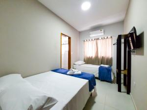 Postel nebo postele na pokoji v ubytování HOTEL CONSAGRADO