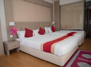 Letto o letti in una camera di Landmark Kathmandu