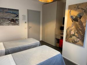 Postel nebo postele na pokoji v ubytování Enjoy Duomo - Flavio Baracchini 9 - Rooms