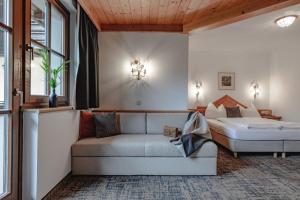 Postel nebo postele na pokoji v ubytování Appartements KATHRIN + 37 fotografií