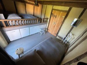 Postel nebo postele na pokoji v ubytování Gîte avec piscine intérieur, Le Repère de Choiseau
