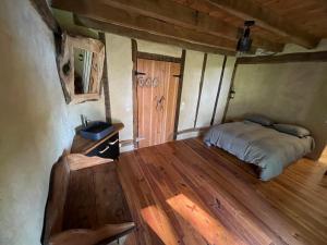 Postel nebo postele na pokoji v ubytování Gîte avec piscine intérieur, Le Repère de Choiseau