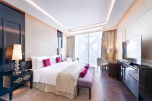 Кровать или кровати в номере Shaza Doha