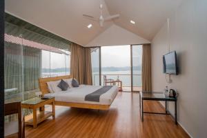 TV a/nebo společenská místnost v ubytování Shvas Island Resort