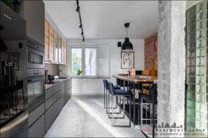 Kuchyň nebo kuchyňský kout v ubytování P&O Apartments Bitwy Warszawskiej - Ochota