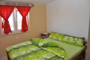 Postel nebo postele na pokoji v ubytování EVA