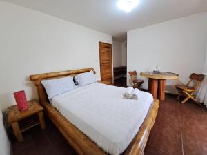 Letto o letti in una camera di Spondylus Lodge