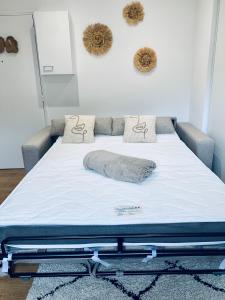 Postel nebo postele na pokoji v ubytování LE NID DE L'AIGLE