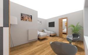 ein Wohnzimmer mit einem Stuhl und ein Schlafzimmer in der Unterkunft Ferienwohnung Cassiopeia in Harzgerode