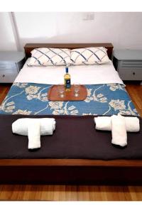 מיטה או מיטות בחדר ב-Kalamaki Guest House
