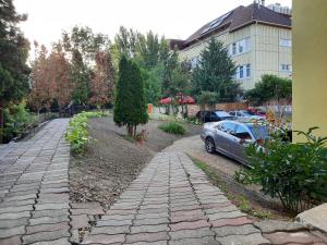 Vonkajšia záhrada v ubytovaní Glória apartman