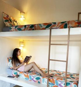 Postel nebo postele na pokoji v ubytování Santo Hostel