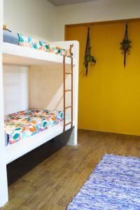 Postel nebo postele na pokoji v ubytování Santo Hostel