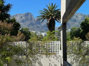 a view of the table mountain from a house at Sea Five Boutique Hotel in Cape Town