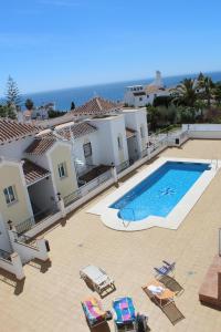 Bazén v ubytovaní Burriana Beach, Pool, big terrace, superb Seaviews alebo v jeho blízkosti