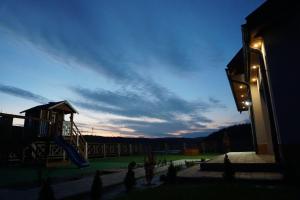 Afbeelding uit fotogalerij van Dom na Wzgórzu SŁOŃCE na wyłączność JACUZZI ELEKTRYCZNE SAUNA ROWERY in Zawóz