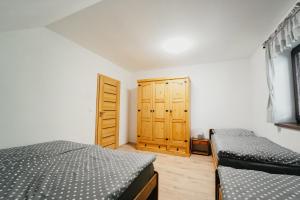 Postel nebo postele na pokoji v ubytování Apartmán Na Palouku Povrly
