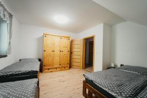 Postel nebo postele na pokoji v ubytování Apartmán Na Palouku Povrly