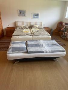 Posteľ alebo postele v izbe v ubytovaní Ferienwohnung ,Hoizmann`