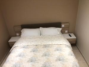 En eller flere senge i et værelse på logement entier indépendant