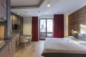 Postel nebo postele na pokoji v ubytování Apparthotel SILBERSEE