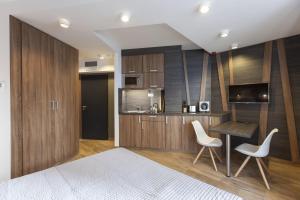 Kuchyň nebo kuchyňský kout v ubytování Apparthotel SILBERSEE