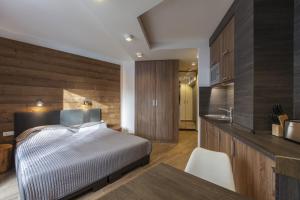 Postel nebo postele na pokoji v ubytování Apparthotel SILBERSEE