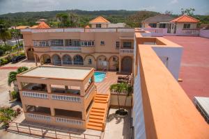 an aerial view of a house with a swimming pool at GC Resort in St Mary