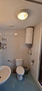 Ένα μπάνιο στο Bungalow GHP-B
