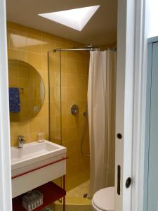 a bathroom with a sink and a shower at Villa Sain Charming Suite in Anacapri