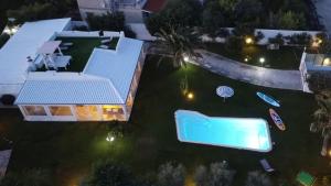 an aerial view of a house with a swimming pool at Villa Miami Vieste in Vieste